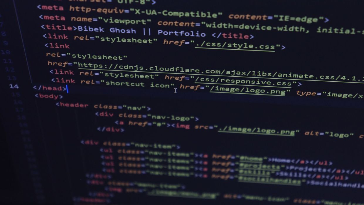 The technical SEO job description: close-up of HTML and CSS code displayed on a computer screen, ideal for tech